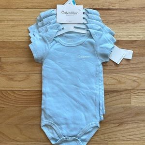 Set of 5 Calvin Klein Baby bodysuits - 6/9months